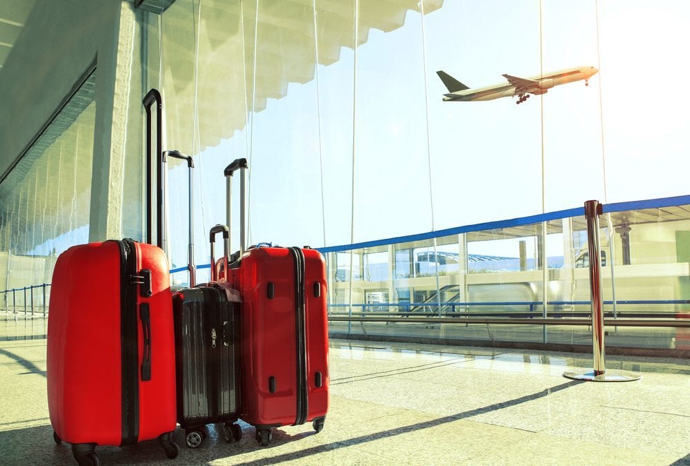 suitcase-in-airport-airplane